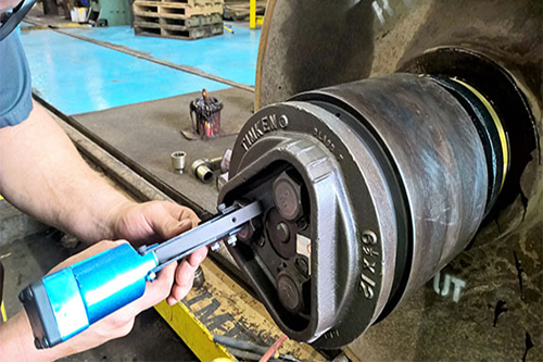 Pneumatic Tab Bending Tool for use with rail car wheel bolt locking plates